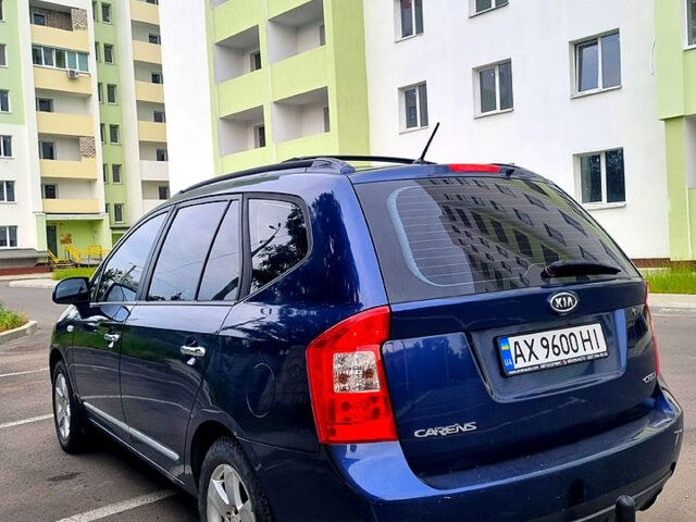 Синій Кіа Каренс, об'ємом двигуна 2 л та пробігом 236 тис. км за 5400 $, фото 12 на Automoto.ua