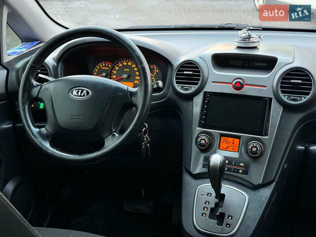 Синий Киа Каренс, объемом двигателя 2 л и пробегом 234 тыс. км за 6990 $, фото 22 на Automoto.ua