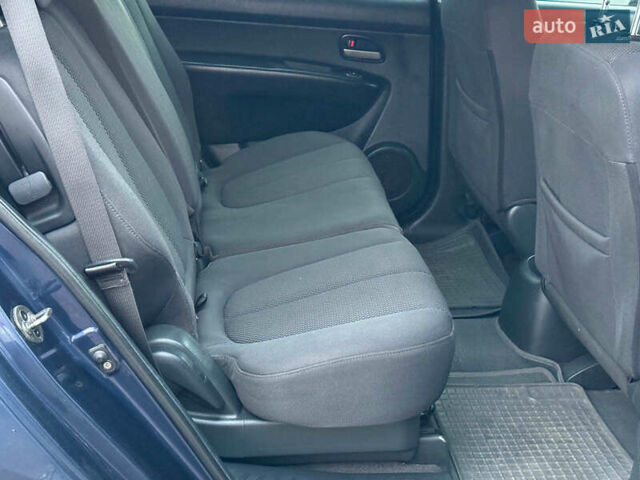 Синий Киа Каренс, объемом двигателя 2 л и пробегом 234 тыс. км за 6990 $, фото 18 на Automoto.ua