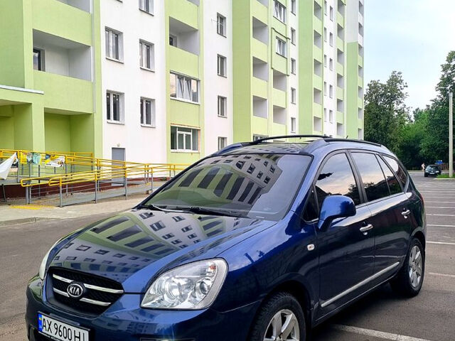 Синій Кіа Каренс, об'ємом двигуна 2 л та пробігом 236 тис. км за 5400 $, фото 9 на Automoto.ua
