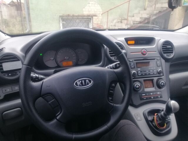 Синий Киа Каренс, объемом двигателя 2 л и пробегом 244 тыс. км за 6000 $, фото 8 на Automoto.ua