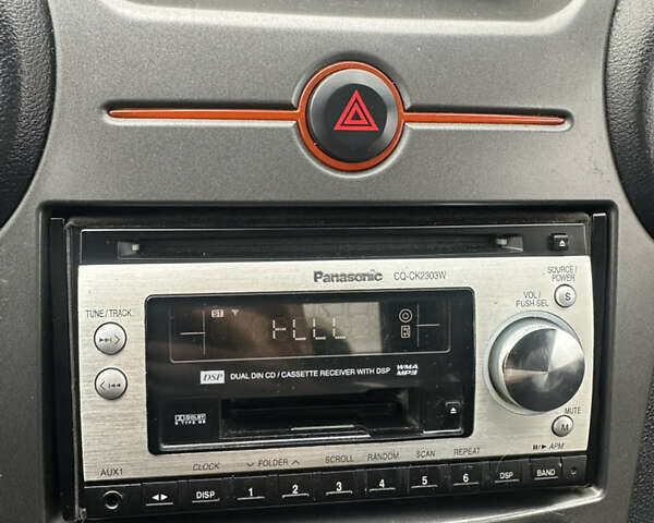 Синій Кіа Каренс, об'ємом двигуна 2 л та пробігом 190 тис. км за 5950 $, фото 16 на Automoto.ua