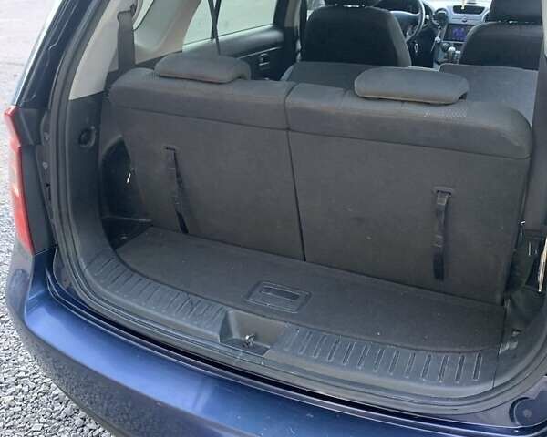 Синий Киа Каренс, объемом двигателя 2 л и пробегом 234 тыс. км за 6500 $, фото 2 на Automoto.ua