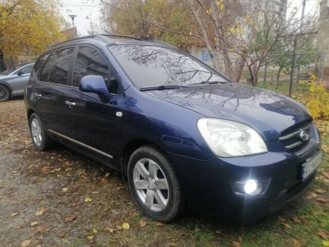 Синий Киа Каренс, объемом двигателя 2 л и пробегом 244 тыс. км за 6000 $, фото 1 на Automoto.ua