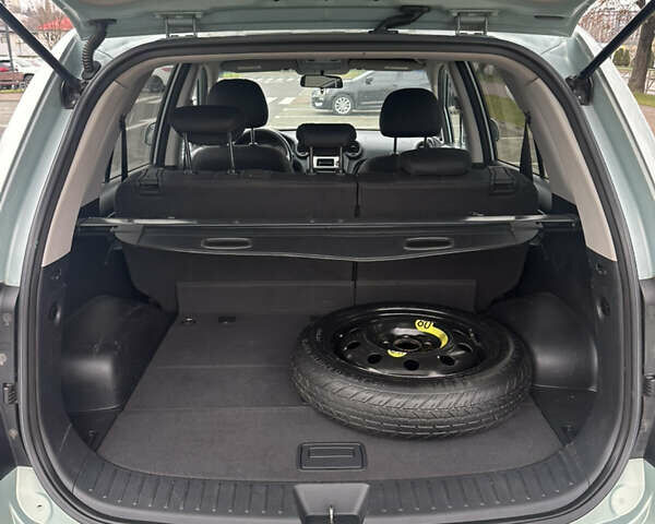 Синій Кіа Каренс, об'ємом двигуна 2 л та пробігом 190 тис. км за 5950 $, фото 12 на Automoto.ua