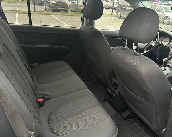 Синій Кіа Каренс, об'ємом двигуна 2 л та пробігом 190 тис. км за 5950 $, фото 10 на Automoto.ua