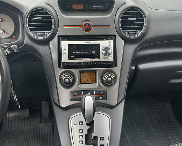 Синій Кіа Каренс, об'ємом двигуна 2 л та пробігом 190 тис. км за 5950 $, фото 9 на Automoto.ua