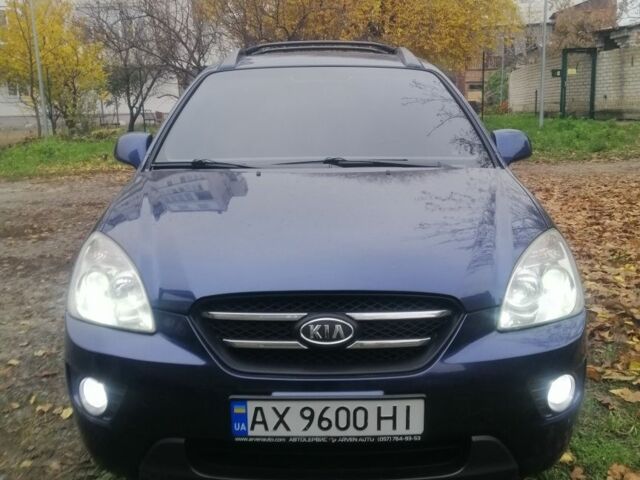 Синий Киа Каренс, объемом двигателя 2 л и пробегом 244 тыс. км за 6000 $, фото 2 на Automoto.ua