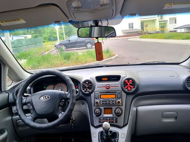 Синій Кіа Каренс, об'ємом двигуна 2 л та пробігом 236 тис. км за 5400 $, фото 5 на Automoto.ua