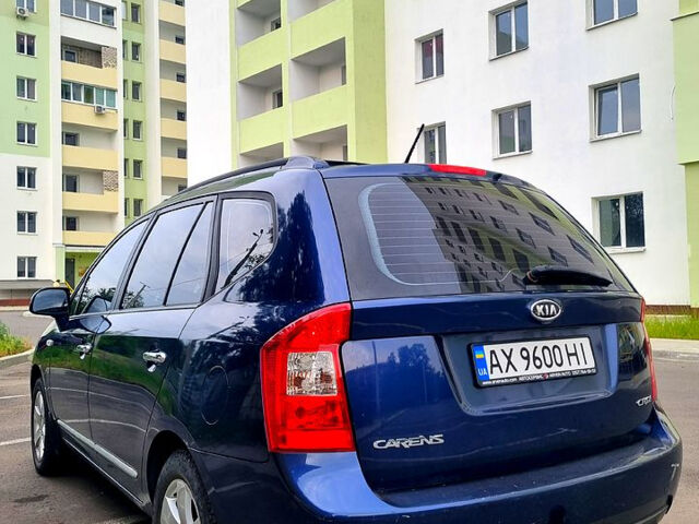 Синій Кіа Каренс, об'ємом двигуна 2 л та пробігом 236 тис. км за 5400 $, фото 4 на Automoto.ua