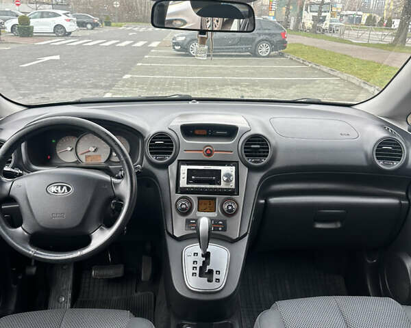 Синій Кіа Каренс, об'ємом двигуна 2 л та пробігом 190 тис. км за 5950 $, фото 8 на Automoto.ua