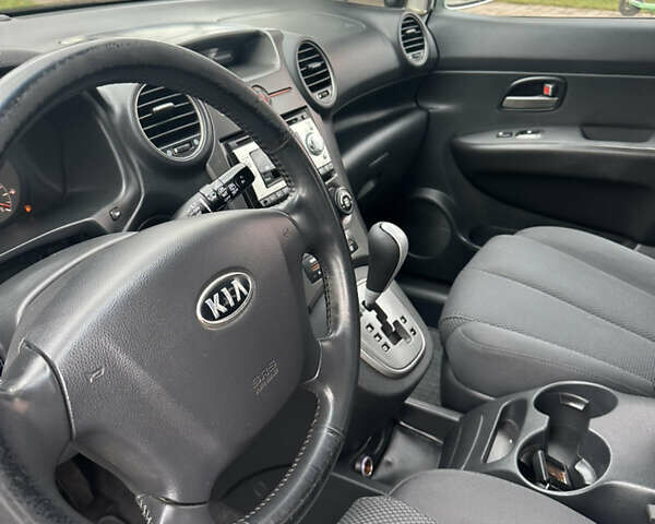 Синій Кіа Каренс, об'ємом двигуна 2 л та пробігом 190 тис. км за 5950 $, фото 15 на Automoto.ua