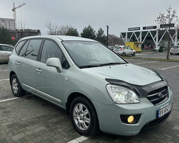 Синій Кіа Каренс, об'ємом двигуна 2 л та пробігом 190 тис. км за 5950 $, фото 4 на Automoto.ua