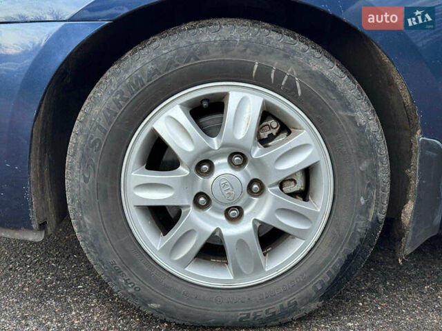 Синий Киа Каренс, объемом двигателя 2 л и пробегом 234 тыс. км за 6990 $, фото 10 на Automoto.ua