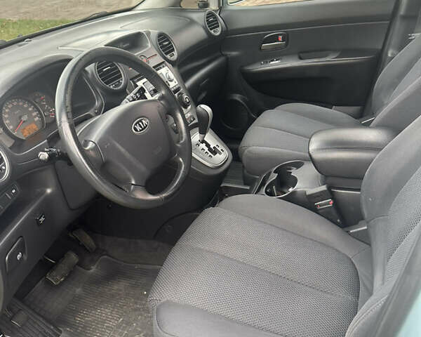 Синій Кіа Каренс, об'ємом двигуна 2 л та пробігом 190 тис. км за 5950 $, фото 6 на Automoto.ua