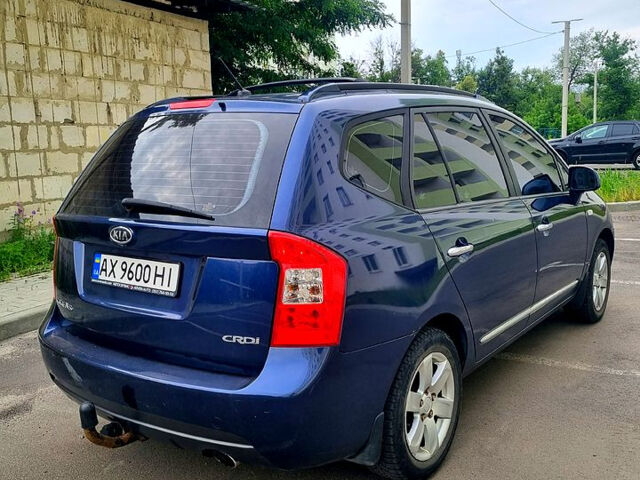 Синій Кіа Каренс, об'ємом двигуна 2 л та пробігом 236 тис. км за 5400 $, фото 11 на Automoto.ua