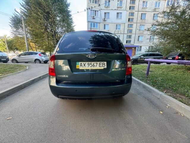 Синий Киа Каренс, объемом двигателя 2 л и пробегом 236 тыс. км за 5950 $, фото 6 на Automoto.ua