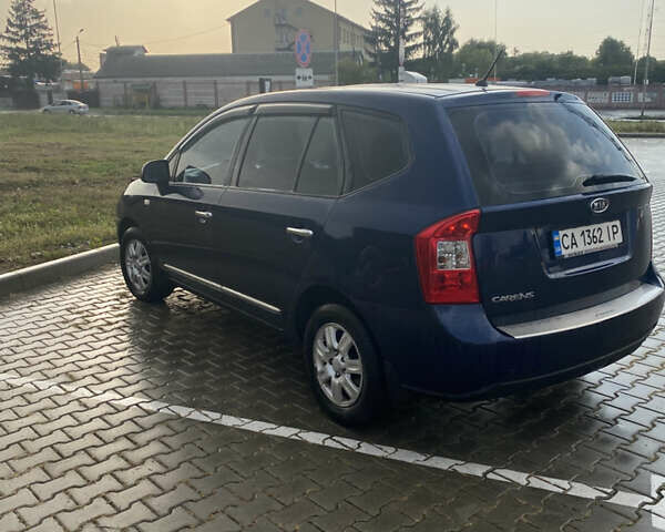 Синий Киа Каренс, объемом двигателя 2 л и пробегом 201 тыс. км за 6400 $, фото 10 на Automoto.ua