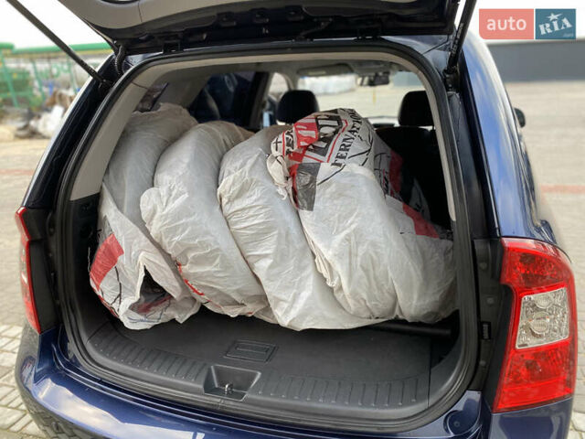 Синій Кіа Каренс, об'ємом двигуна 1.99 л та пробігом 251 тис. км за 6699 $, фото 39 на Automoto.ua