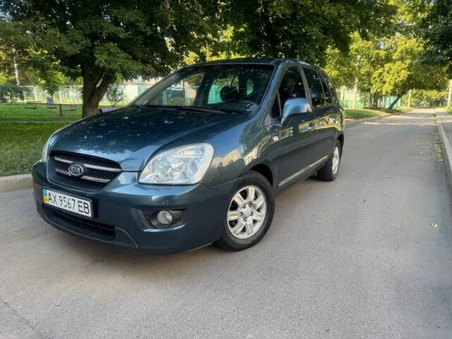 Синий Киа Каренс, объемом двигателя 2 л и пробегом 236 тыс. км за 5950 $, фото 1 на Automoto.ua