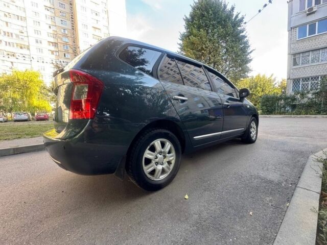 Синий Киа Каренс, объемом двигателя 2 л и пробегом 236 тыс. км за 5950 $, фото 3 на Automoto.ua