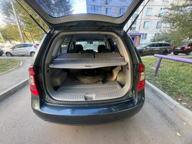 Синий Киа Каренс, объемом двигателя 2 л и пробегом 236 тыс. км за 5950 $, фото 13 на Automoto.ua
