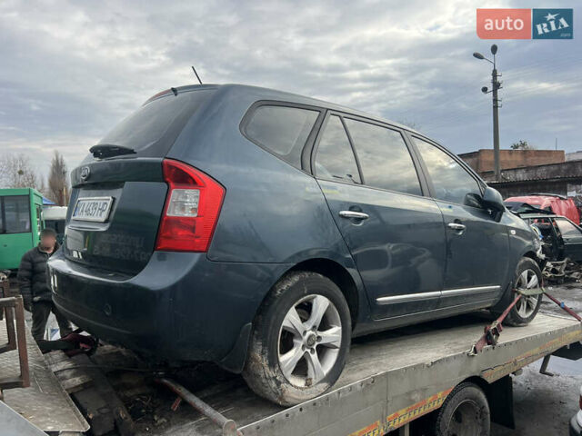Синий Киа Каренс, объемом двигателя 2 л и пробегом 176 тыс. км за 2399 $, фото 16 на Automoto.ua