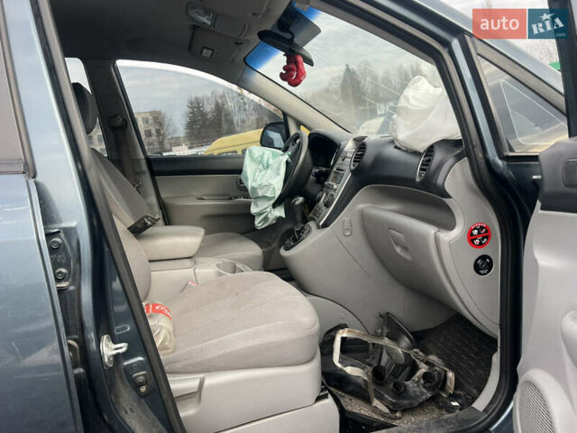 Синий Киа Каренс, объемом двигателя 2 л и пробегом 176 тыс. км за 2399 $, фото 9 на Automoto.ua