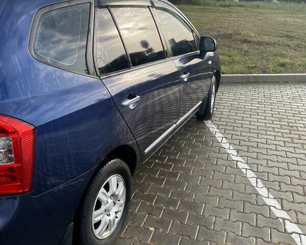 Синий Киа Каренс, объемом двигателя 2 л и пробегом 201 тыс. км за 6400 $, фото 1 на Automoto.ua