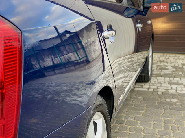 Синій Кіа Каренс, об'ємом двигуна 1.99 л та пробігом 251 тис. км за 6699 $, фото 23 на Automoto.ua