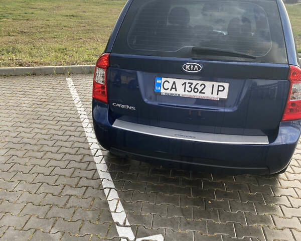 Синий Киа Каренс, объемом двигателя 2 л и пробегом 201 тыс. км за 6400 $, фото 9 на Automoto.ua