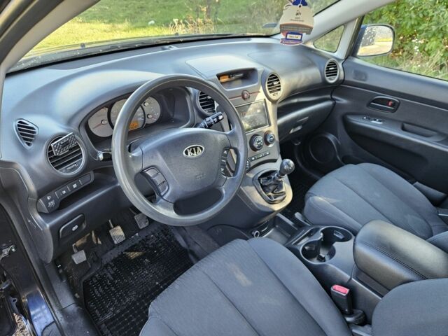 Синий Киа Каренс, объемом двигателя 2 л и пробегом 269 тыс. км за 2750 $, фото 12 на Automoto.ua
