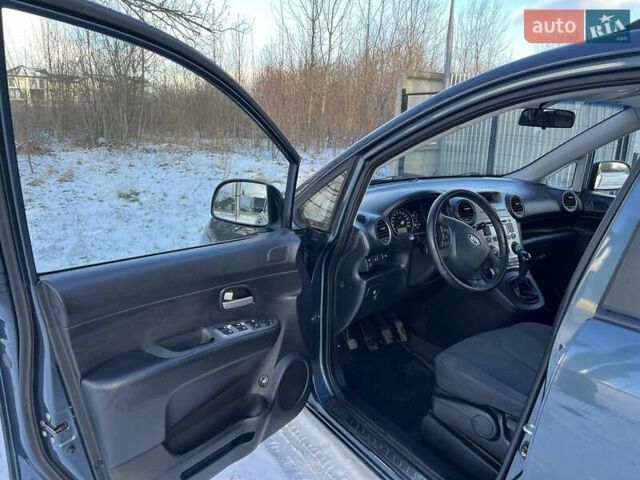 Синій Кіа Каренс, об'ємом двигуна 2 л та пробігом 233 тис. км за 7700 $, фото 6 на Automoto.ua