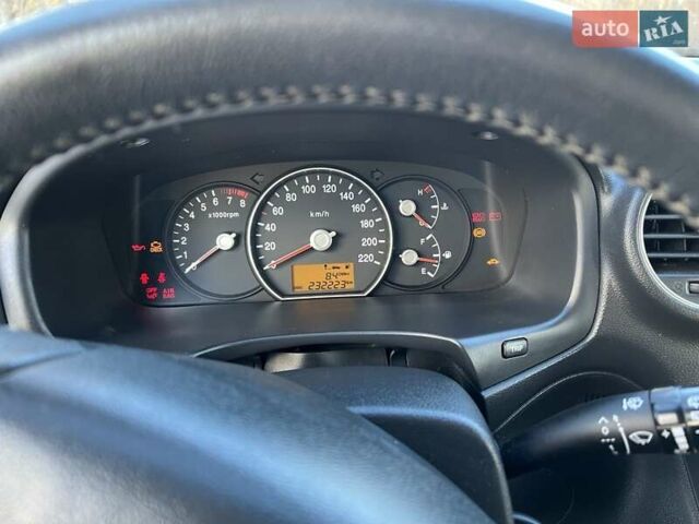 Синій Кіа Каренс, об'ємом двигуна 2 л та пробігом 233 тис. км за 7700 $, фото 9 на Automoto.ua