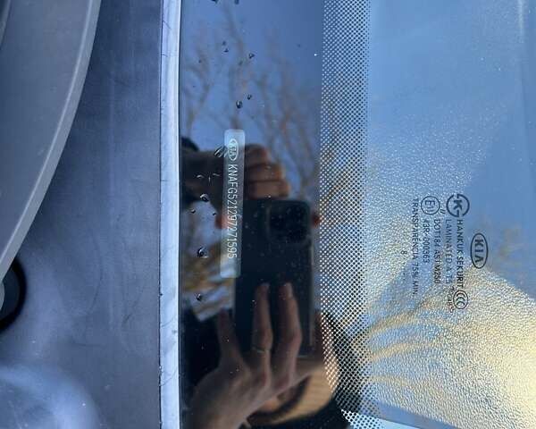 Синій Кіа Каренс, об'ємом двигуна 2 л та пробігом 233 тис. км за 7700 $, фото 12 на Automoto.ua