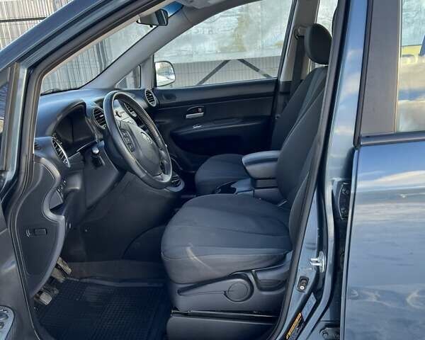 Синій Кіа Каренс, об'ємом двигуна 2 л та пробігом 233 тис. км за 7700 $, фото 8 на Automoto.ua
