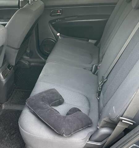 Синий Киа Каренс, объемом двигателя 2 л и пробегом 153 тыс. км за 6900 $, фото 17 на Automoto.ua