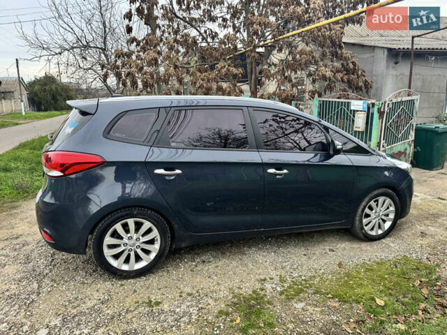 Синій Кіа Каренс, об'ємом двигуна 1.7 л та пробігом 75 тис. км за 13000 $, фото 4 на Automoto.ua