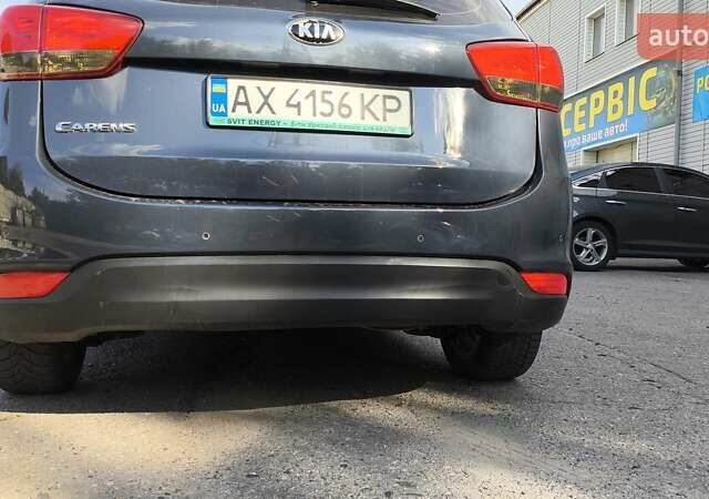 Синій Кіа Каренс, об'ємом двигуна 2 л та пробігом 228 тис. км за 10200 $, фото 5 на Automoto.ua