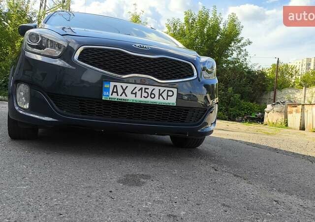 Синій Кіа Каренс, об'ємом двигуна 2 л та пробігом 228 тис. км за 10200 $, фото 1 на Automoto.ua