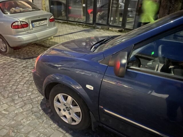 Синий Киа Каренс, объемом двигателя 2 л и пробегом 260 тыс. км за 3200 $, фото 8 на Automoto.ua