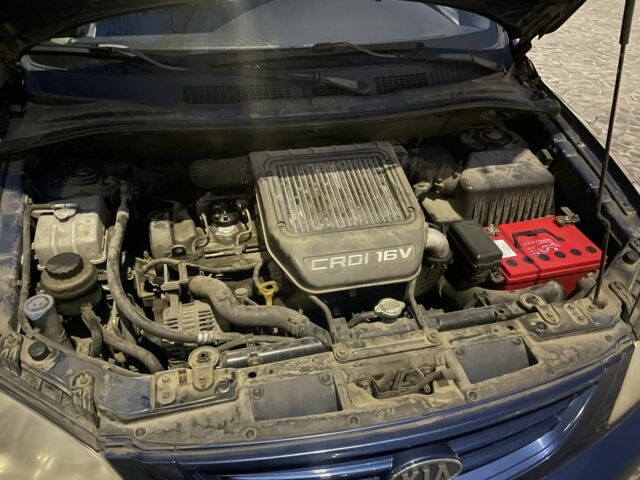 Синий Киа Каренс, объемом двигателя 2 л и пробегом 260 тыс. км за 3200 $, фото 9 на Automoto.ua