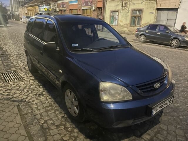 Синий Киа Каренс, объемом двигателя 2 л и пробегом 260 тыс. км за 3200 $, фото 2 на Automoto.ua