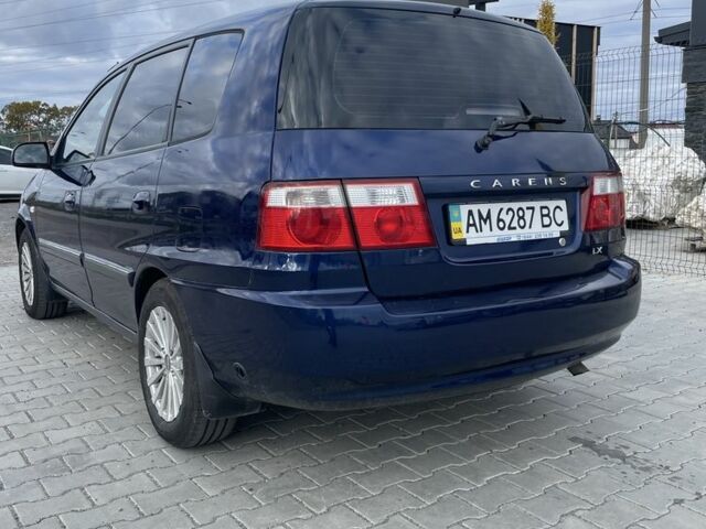 Синий Киа Каренс, объемом двигателя 2 л и пробегом 187 тыс. км за 3800 $, фото 1 на Automoto.ua