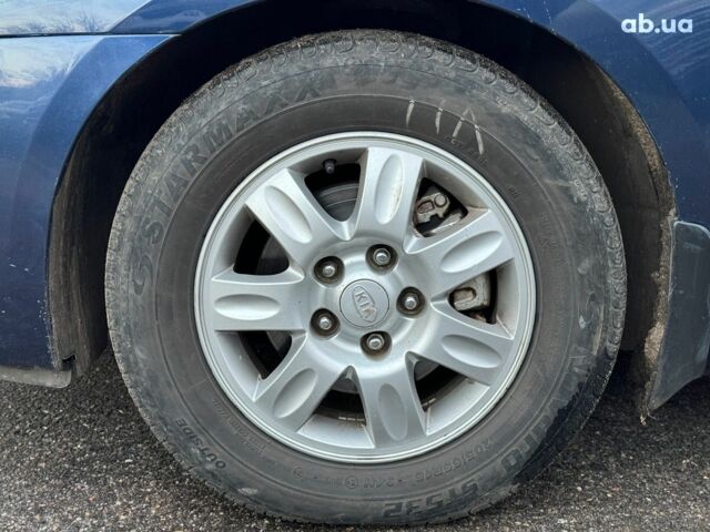 Синий Киа Каренс, объемом двигателя 2 л и пробегом 234 тыс. км за 6990 $, фото 9 на Automoto.ua