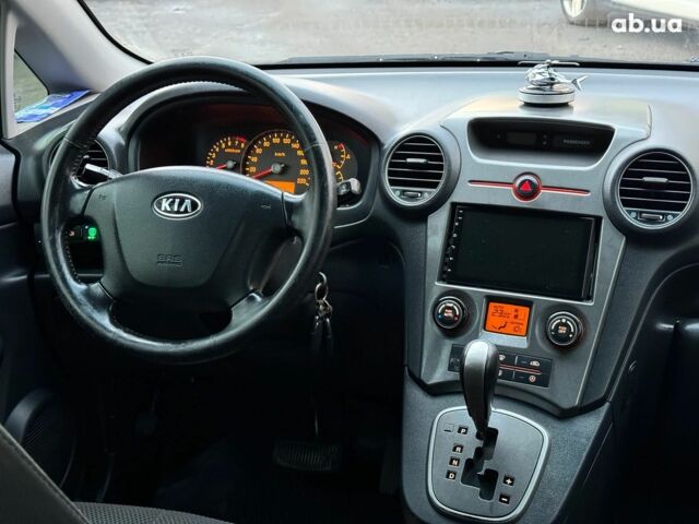 Синий Киа Каренс, объемом двигателя 2 л и пробегом 234 тыс. км за 6990 $, фото 23 на Automoto.ua