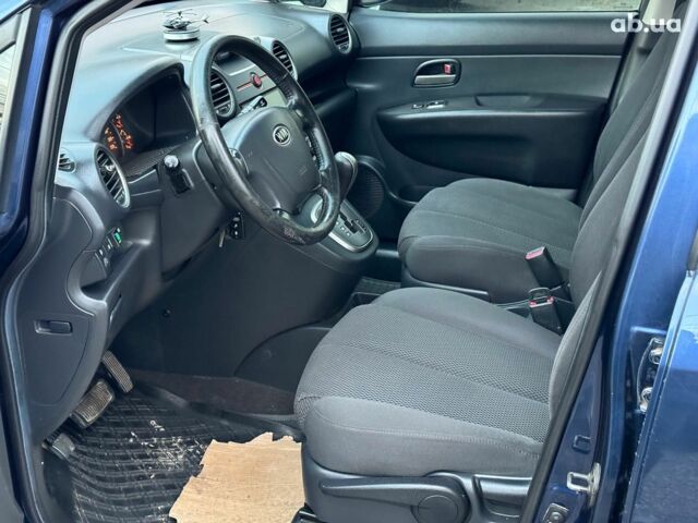 Синий Киа Каренс, объемом двигателя 2 л и пробегом 234 тыс. км за 6990 $, фото 12 на Automoto.ua