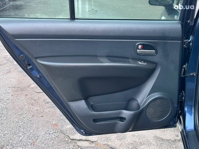 Синий Киа Каренс, объемом двигателя 2 л и пробегом 234 тыс. км за 6990 $, фото 15 на Automoto.ua