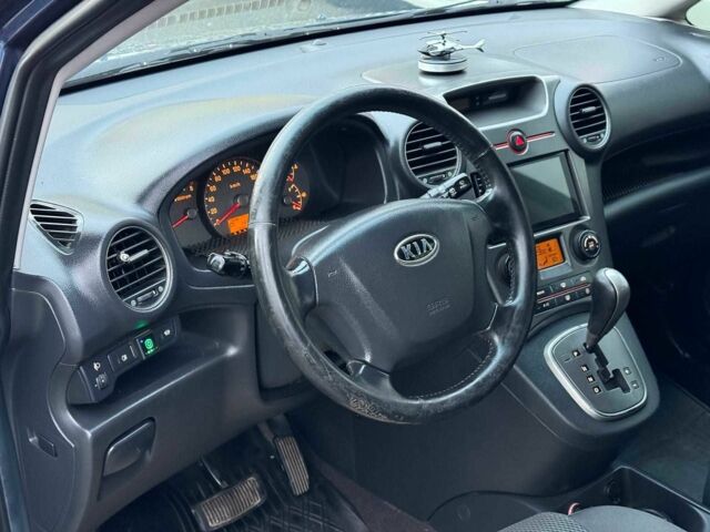 Синий Киа Каренс, объемом двигателя 2 л и пробегом 234 тыс. км за 6990 $, фото 13 на Automoto.ua