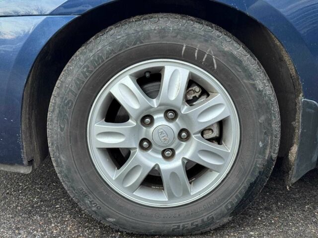 Синий Киа Каренс, объемом двигателя 2 л и пробегом 234 тыс. км за 6990 $, фото 9 на Automoto.ua